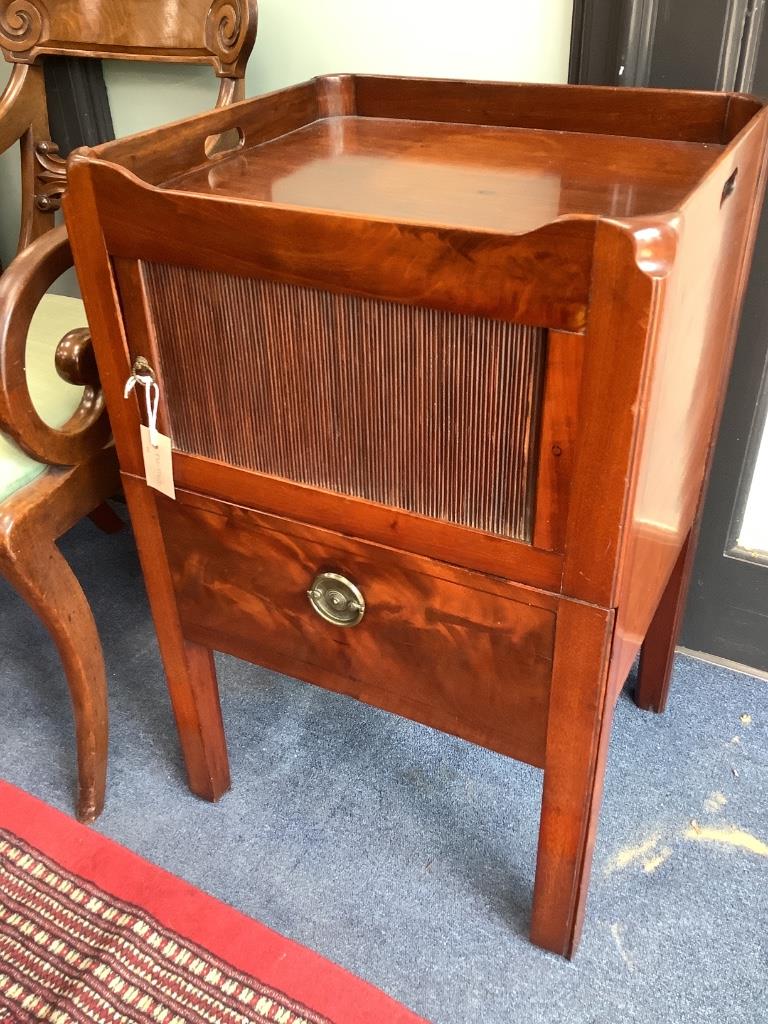 A Georgian mahogany tray-top commode, having tambour shutter on square supports, width 50cm depth 45cm height 78cm
